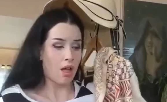 The beauty caresses and appeals herself
