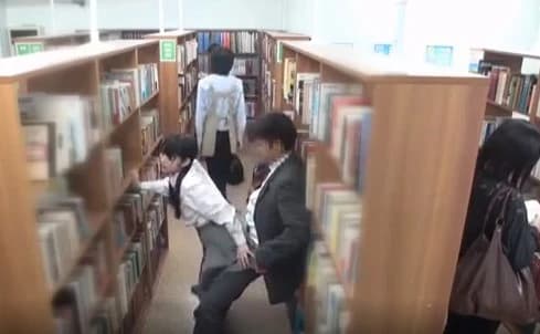 Guys fuck Japanese schoolgirls in the middle of the library