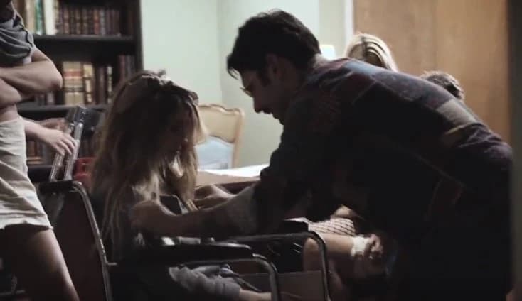 The girl in a wheelchair for the first time tries a member